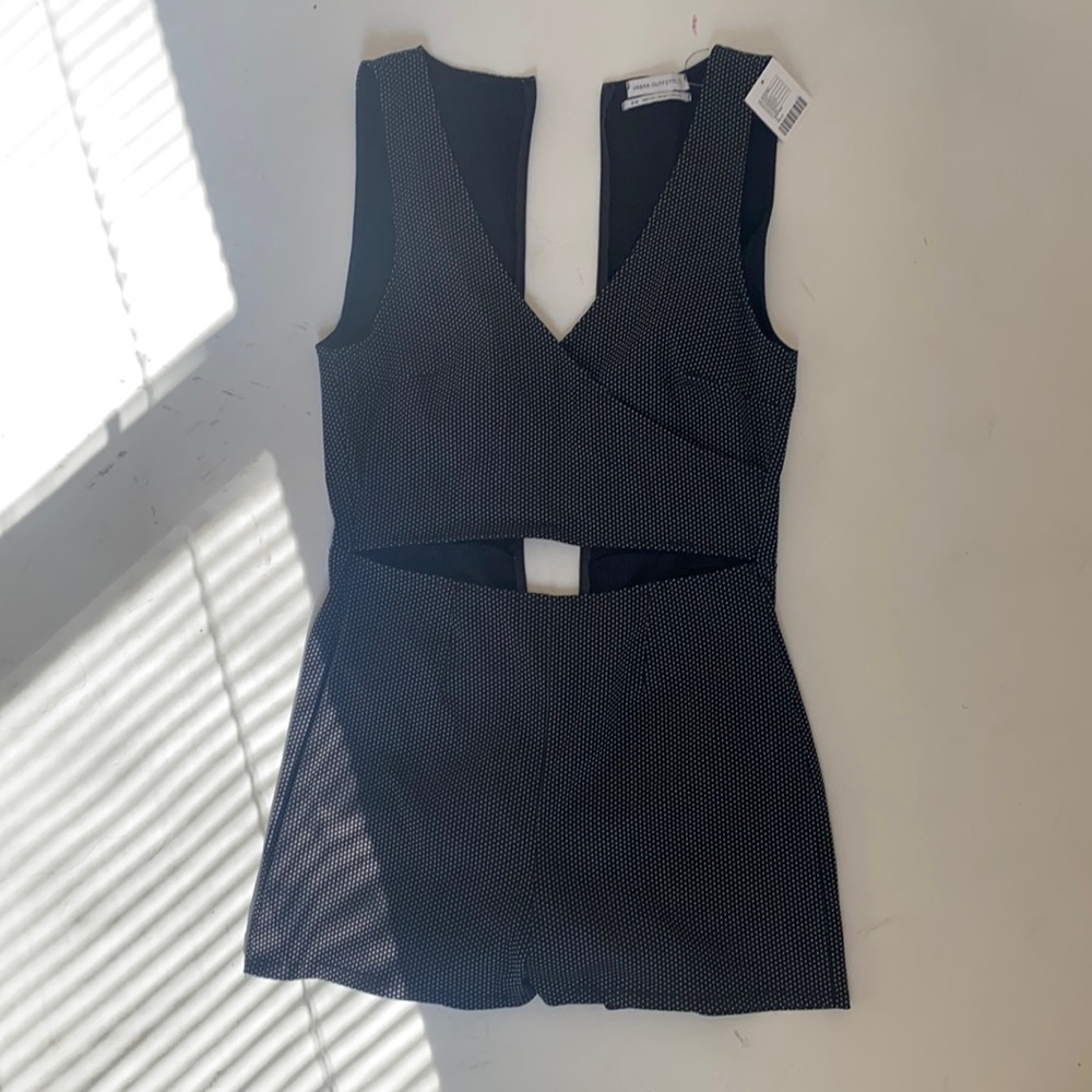 Romper urban outfitters. Black with polka dots.